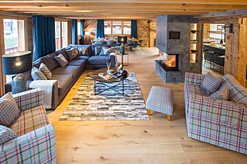 A living room filled with furniture and a fireplace