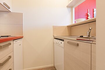 A kitchen with a dishwasher that says lg on it