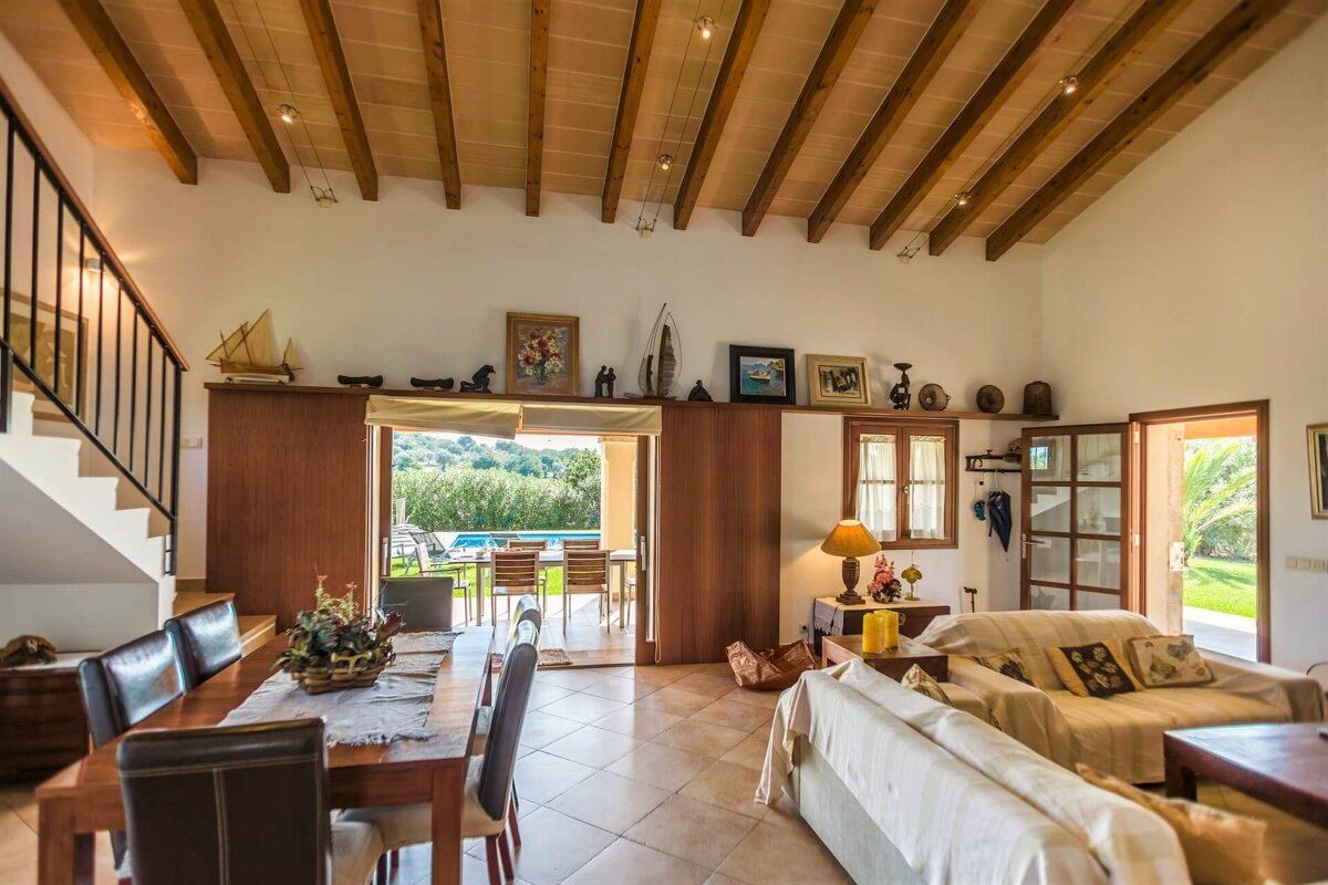 A living room with a couch and a table