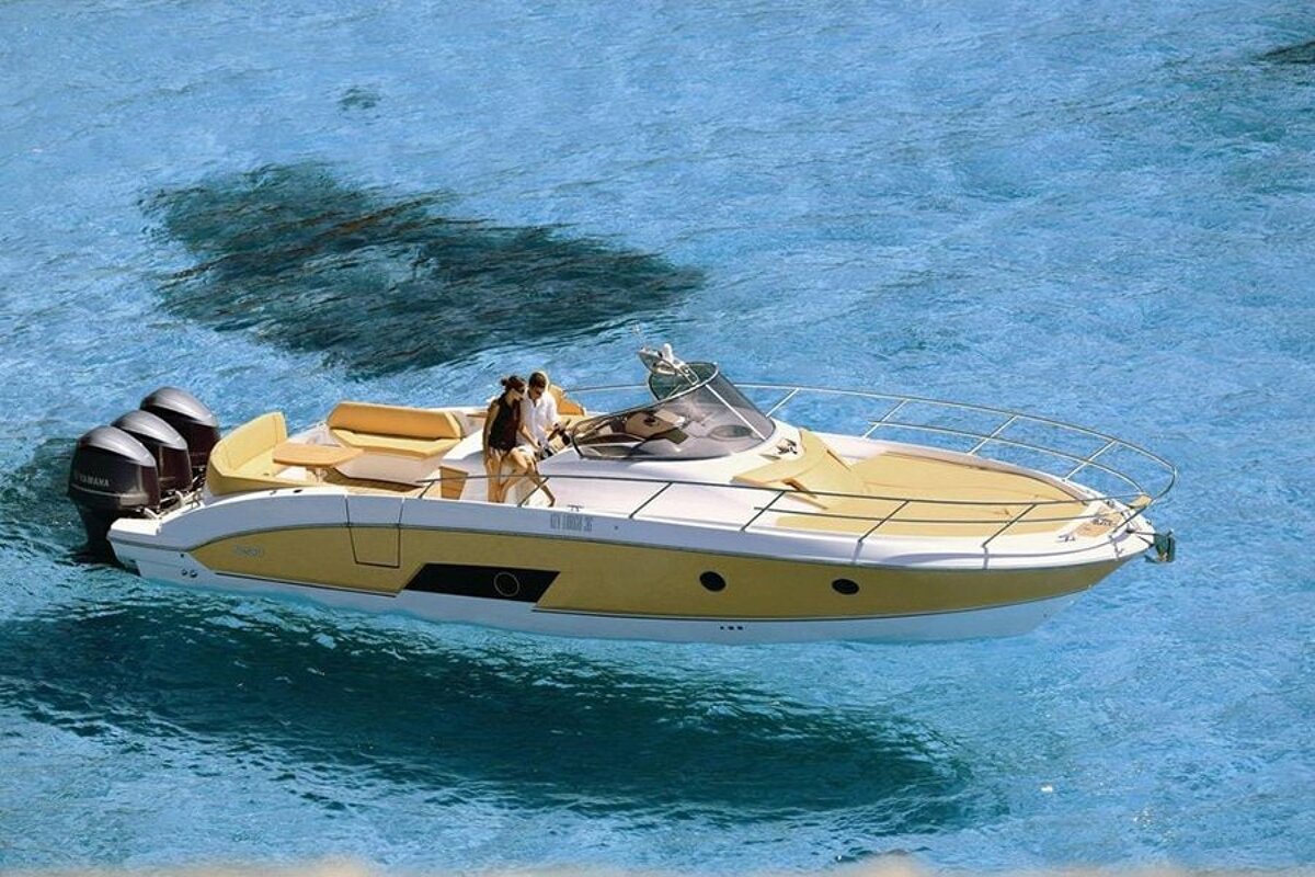 A yamaha boat is floating in the water
