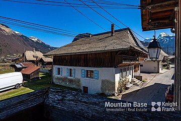 A mountain base advertisement for a real estate company