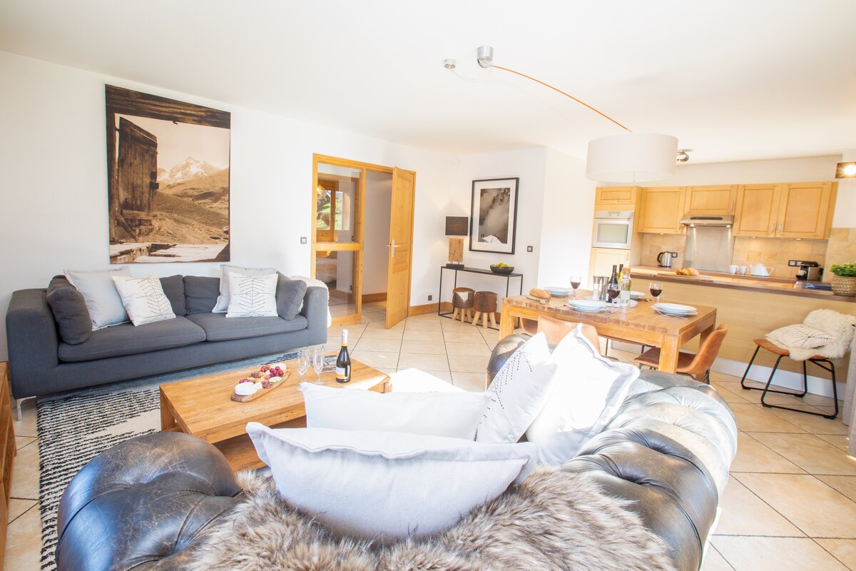 A living room with a couch and a coffee table