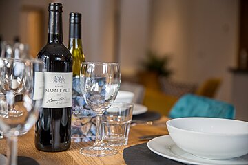 A bottle of montplo wine sits on a table