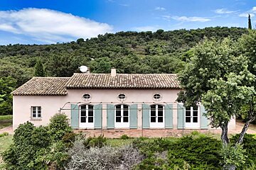 A house with a satellite dish on the roof