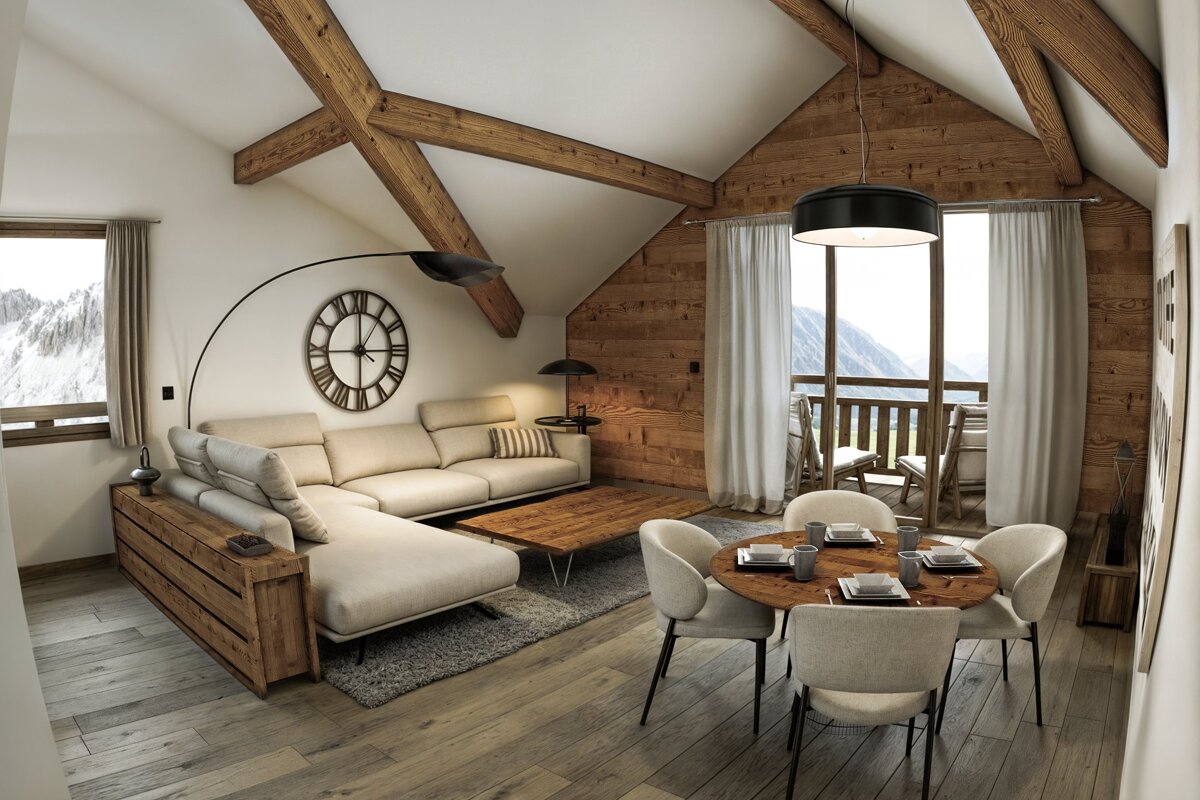 Modern chalet living room featuring exposed wooden beams, a cream sectional sofa, a dining area, and scenic mountain views.