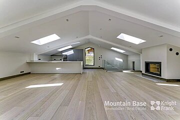 An empty room with a knight frank logo on the bottom