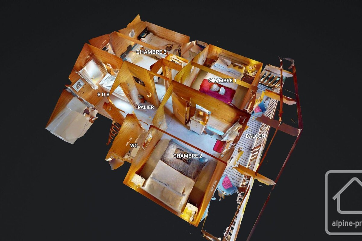 An aerial view of a house showing the bedrooms and balcony