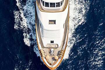 An aerial view of a large yacht in the ocean