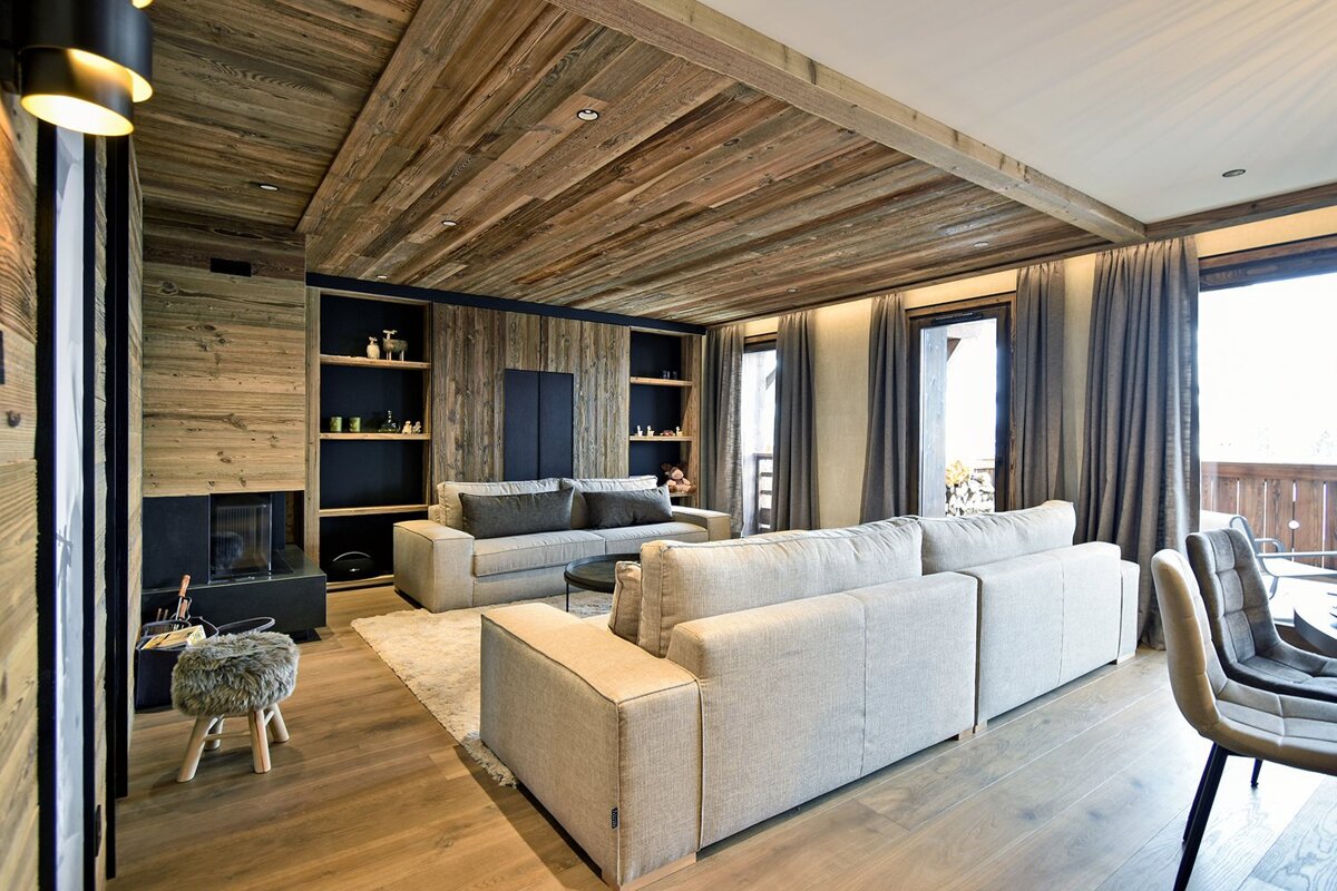 A living room with a couch and a fireplace