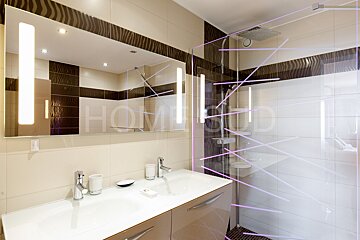 A bathroom with the word home written on the wall