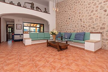 A living room with a couch and a coffee table