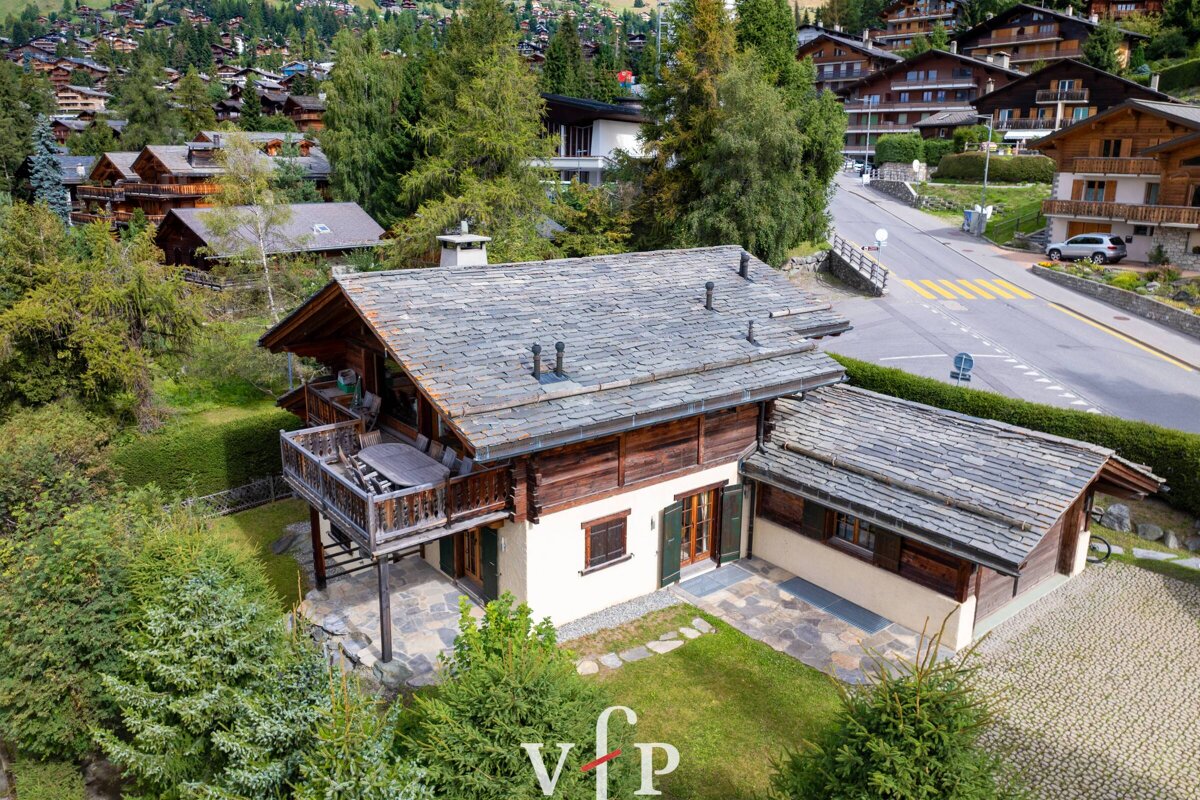 An aerial view of a house with the letters vfp on the bottom