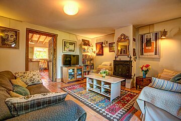 A living room with a couch and a television