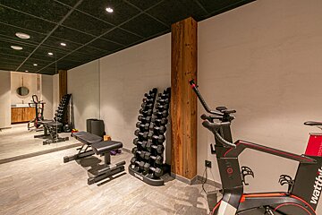 A gym with a bike that says wahoo on it