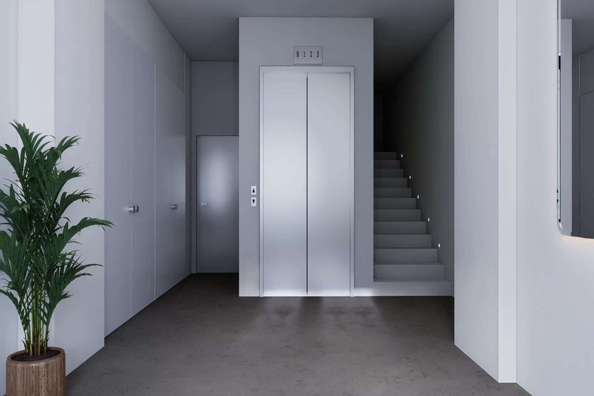 A modern, minimalist grey-and-white hallway features a central elevator, a dimly lit staircase to the right, and various doors. A potted plant sits left.