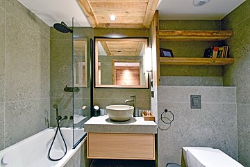 A bathroom with a sink and a bathtub