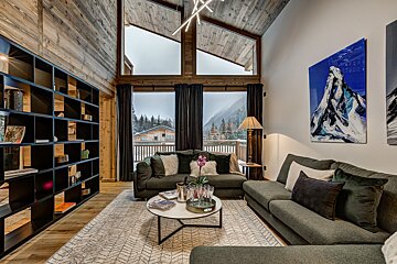 A living room with a couch and a coffee table