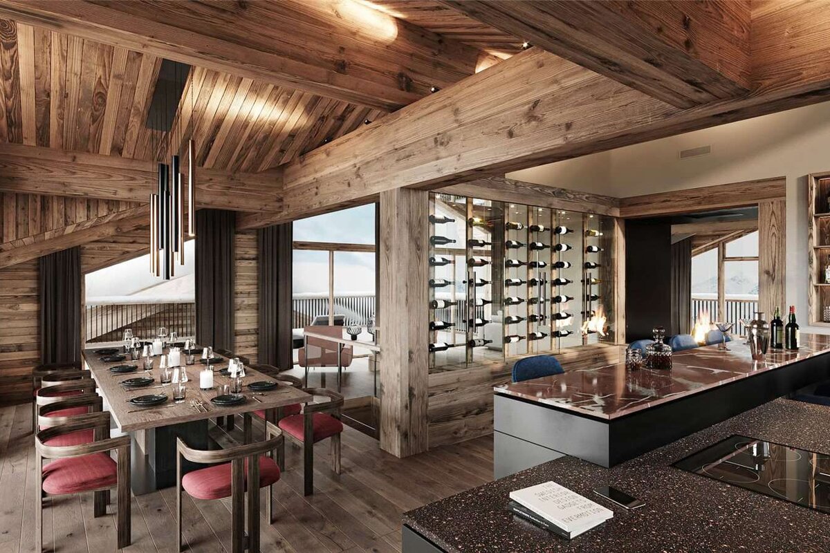 A dining room with a table and chairs and a book on the counter