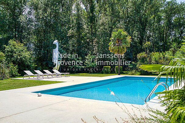 A large swimming pool with the words made in provence written on it