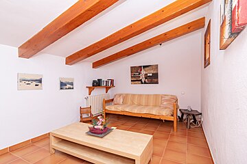 A living room with a couch and a coffee table