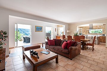 A living room with a couch and a coffee table