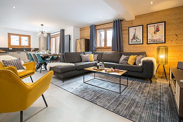 A living room with a couch and a coffee table