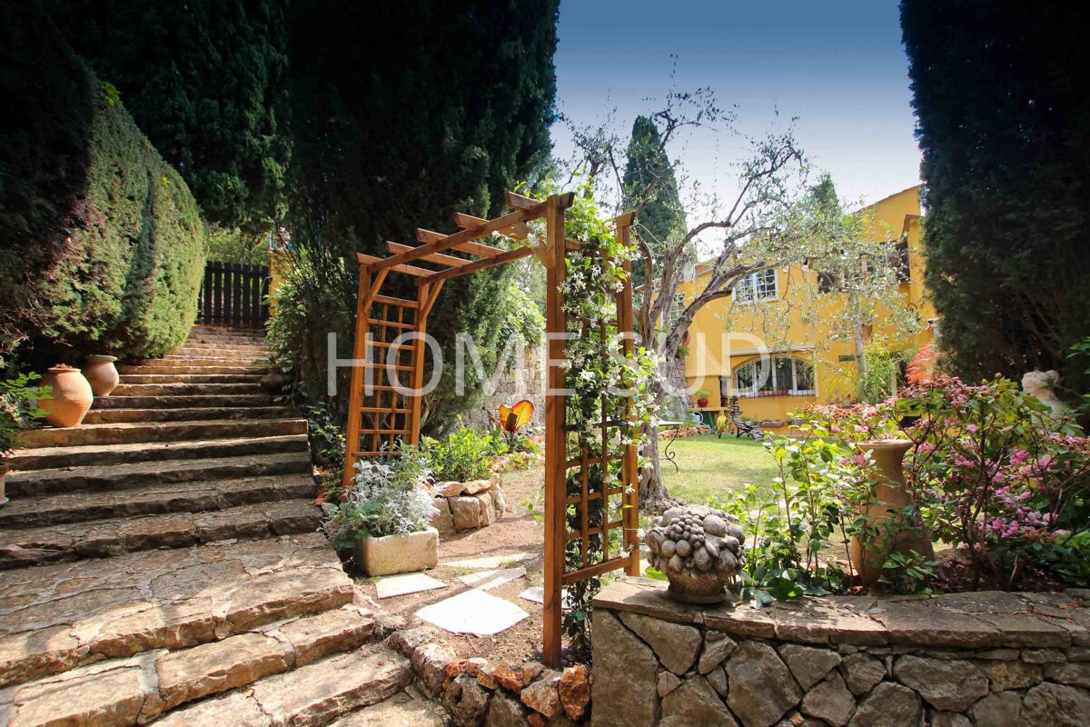 The word home is on the side of a house