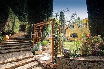 The word home is on the side of a house