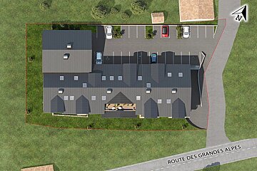 Aerial render of a multi-unit building with a grey roof, an adjacent parking lot, green lawn, and a road labeled 