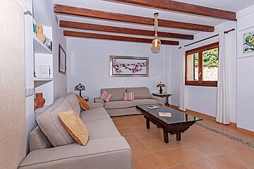 A living room with a couch and a coffee table