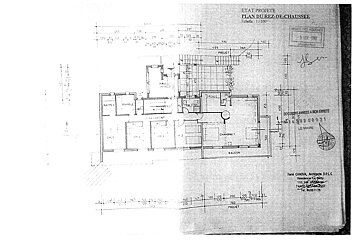 A black and white drawing of a house has the word projet at the top