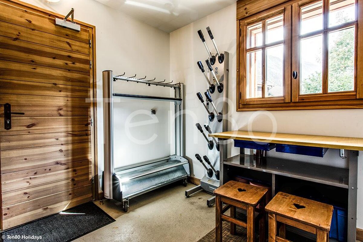 A picture of a boot dryer with the word holidays on the bottom