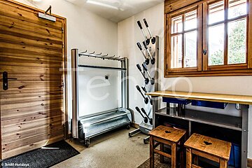 A picture of a boot dryer with the word holidays on the bottom