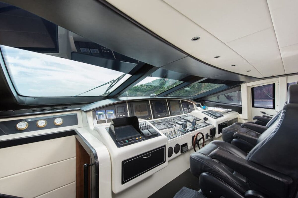 A cockpit of a boat with a monitor that says ' gps ' on it