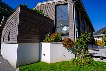 A house with the number 1 on the side of it