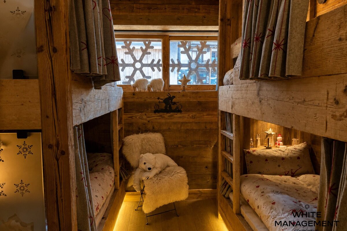 A bathroom with a bathtub a sink and a toilet