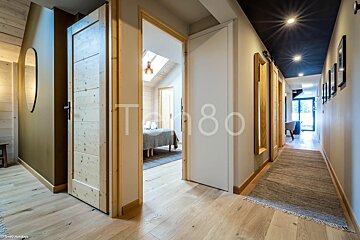 A hallway with the number 80 on the wall