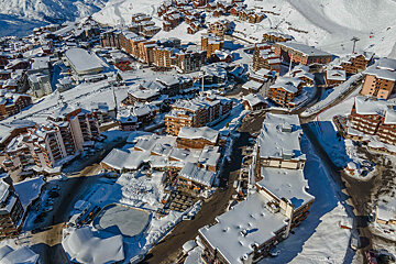 An aerial view of a snow covered ski resort
