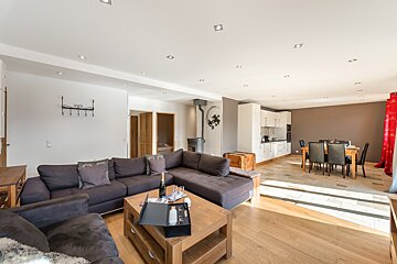 A living room with a couch and a coffee table