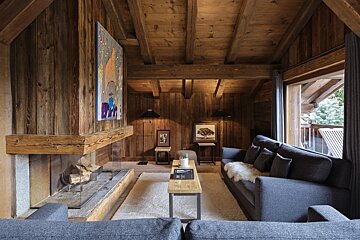 A living room with a fireplace and a couch