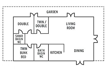 A black and white floor plan of a house with a garden