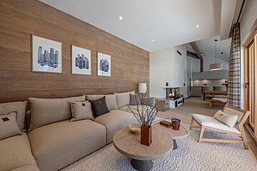 A living room with a couch and a coffee table