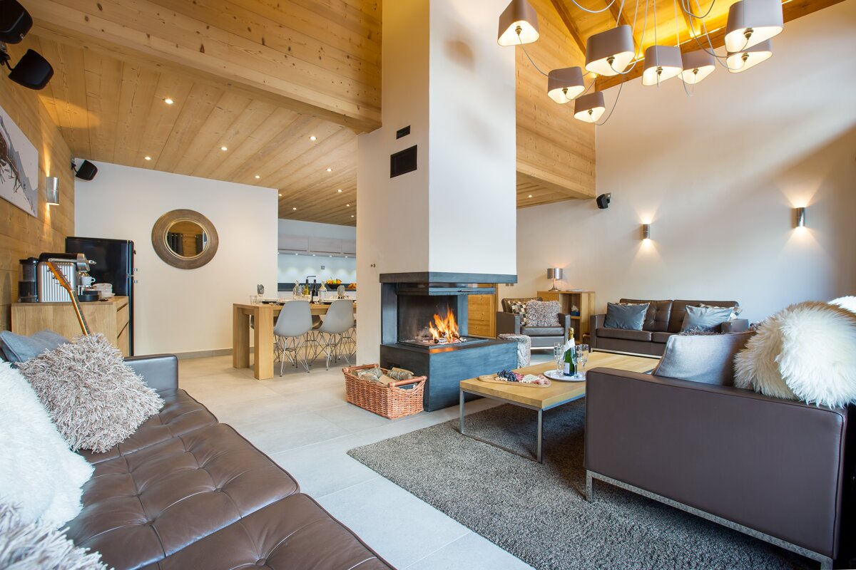 A living room with a fireplace and a couch