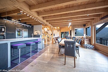 A photo of a kitchen and dining room by alex james robson