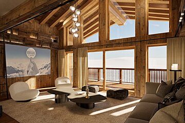 A living room with a painting of mountains on the wall