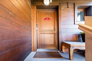 A wooden door with the number a3 on it