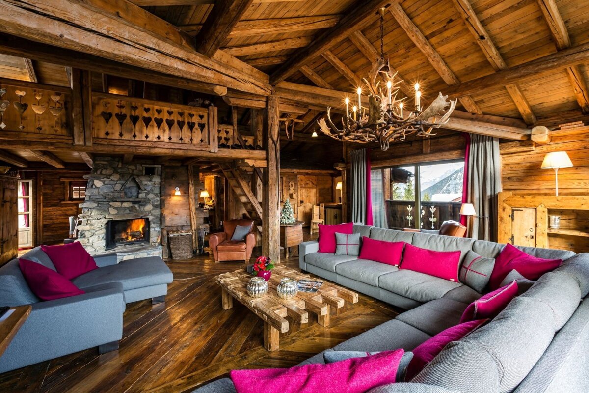 A living room filled with furniture and a fireplace