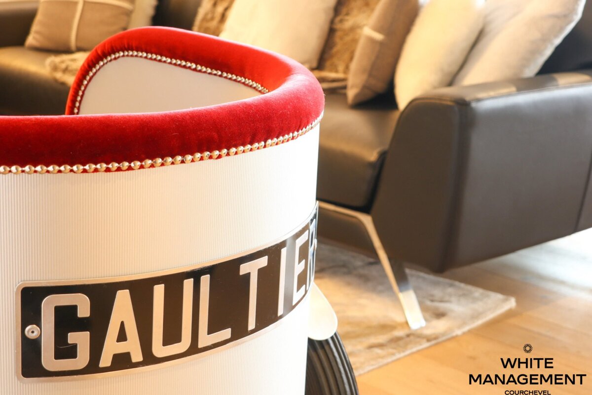 A white chair with the word gault on it