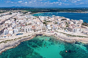 An aerial view of a small town on a sunny day
