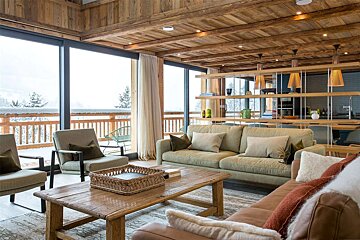 A living room with a couch and a coffee table